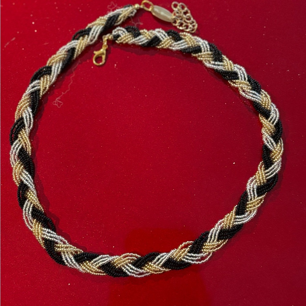 Murano glass braided choker.  The beads are black, gold and silver.